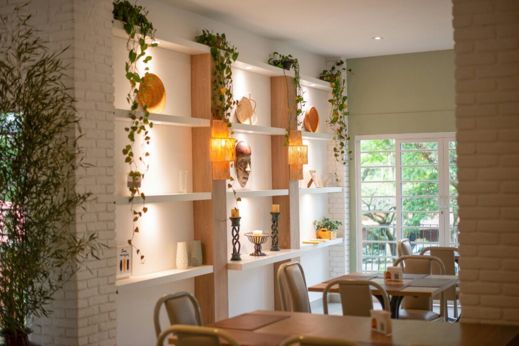 Menu Stylish restaurant interior in Socorro, SP featuring modern decor and shelving.